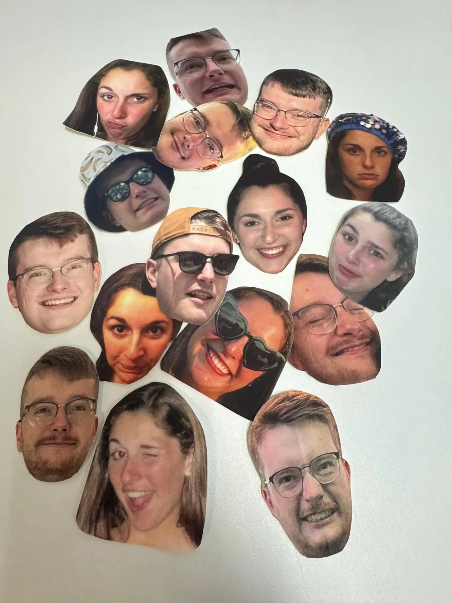 Collage of many custom face pasties on a white background